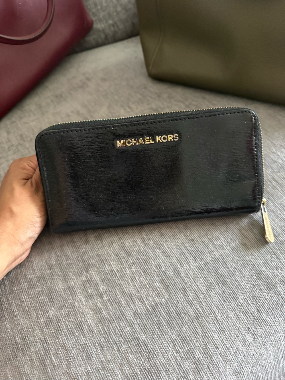 Michael Kors Black Patent Zip-Around Wallet with Gold Logo